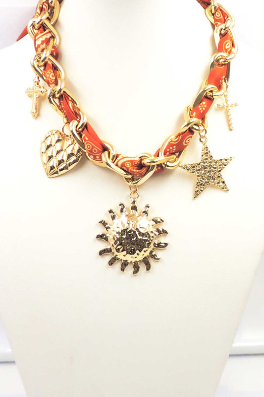 Orange Scarf with Gold Interlocking and Heart, Star, and Cross Charm Necklace