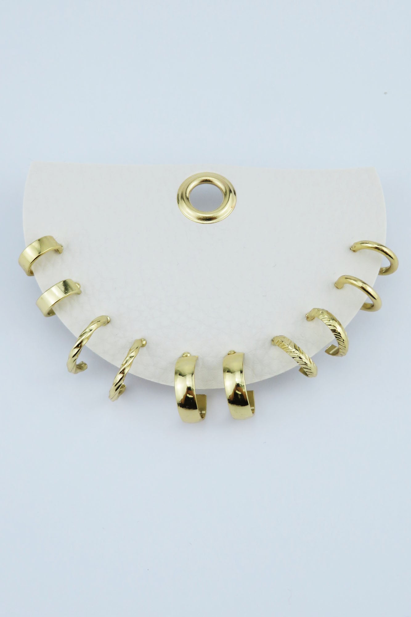 Set of 5 Small Gold Hoops on Leather Card