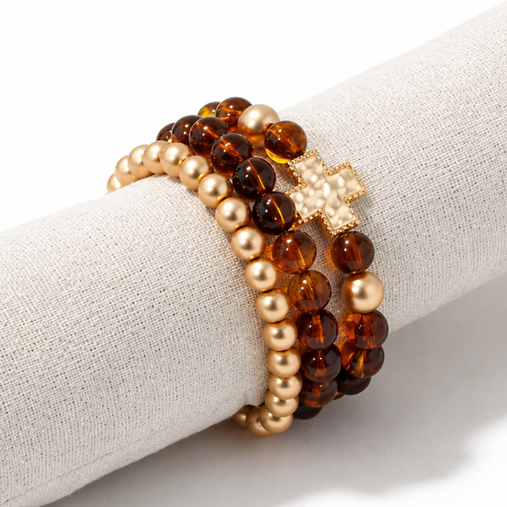 Set of Three Gold Beaded with Brown Beaded and Gold Hammered Cross Stretch Bracelets