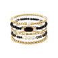 Set of 5 Black Crystal, Pearl, and Gold Stretch Bracelets