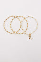 Set of Three Gold and Pearl Stretch Bracelets with Light Blue Bow on White Cowboy Boot Charm