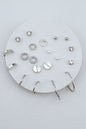 Set of 10 Silver Geometric Stud and Hoop Sets on a Leather Circle Display, Best Seller!