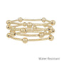 Water Resistant Set of 4 Gold Piping and Gold Stretch Bracelets
