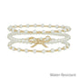 Set of 3 Pearl and Gold with Gold Bow Stretch Bracelets