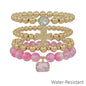 Water Resistant Set of 4 Cross and Pink Crystal Beaded Stretch Bracelets