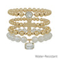 Water Resistant Set of 4 Cross and White Crystal Beaded Stretch Bracelets