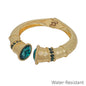 Water Resistant Worn Gold Classy Hinged Bracelet with Green Crystal Accents