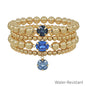 Water Resistant Gold Beaded with Navy Crystal Accents Set of 4 Stretch Bracelets