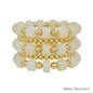 Water Resistant White and Gold Oval Chunky Beaded Set of 5 Stretch Bracelet