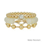 Water Resistant Set of 3 White Beaded and Gold Stretch Bracelets