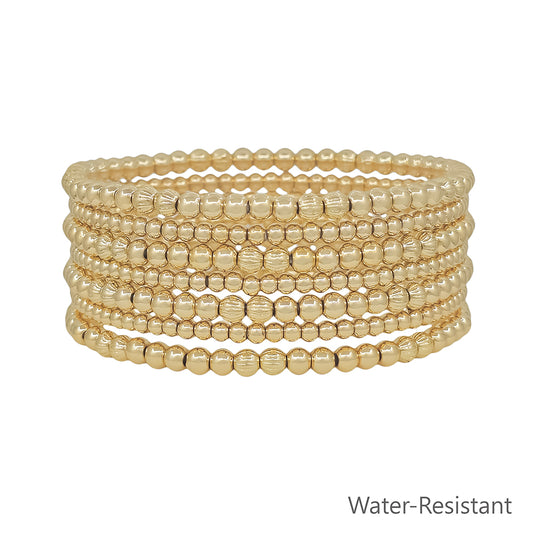 Water Resistant Set of 7 Gold 4MM and 2MM Stretch Bracelets