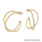 Gold Textured Twisted X 1.25" Hoop Earring