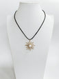 Black Leather Cord with Pearl and Gold Sunburst Charm Necklace