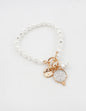 Pearl Toggle 7.5" Bracelet with Open Cross and Crystal Charms