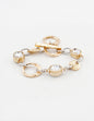 Gold and Silver Textured Open Circles with Clear Stone Bracelet